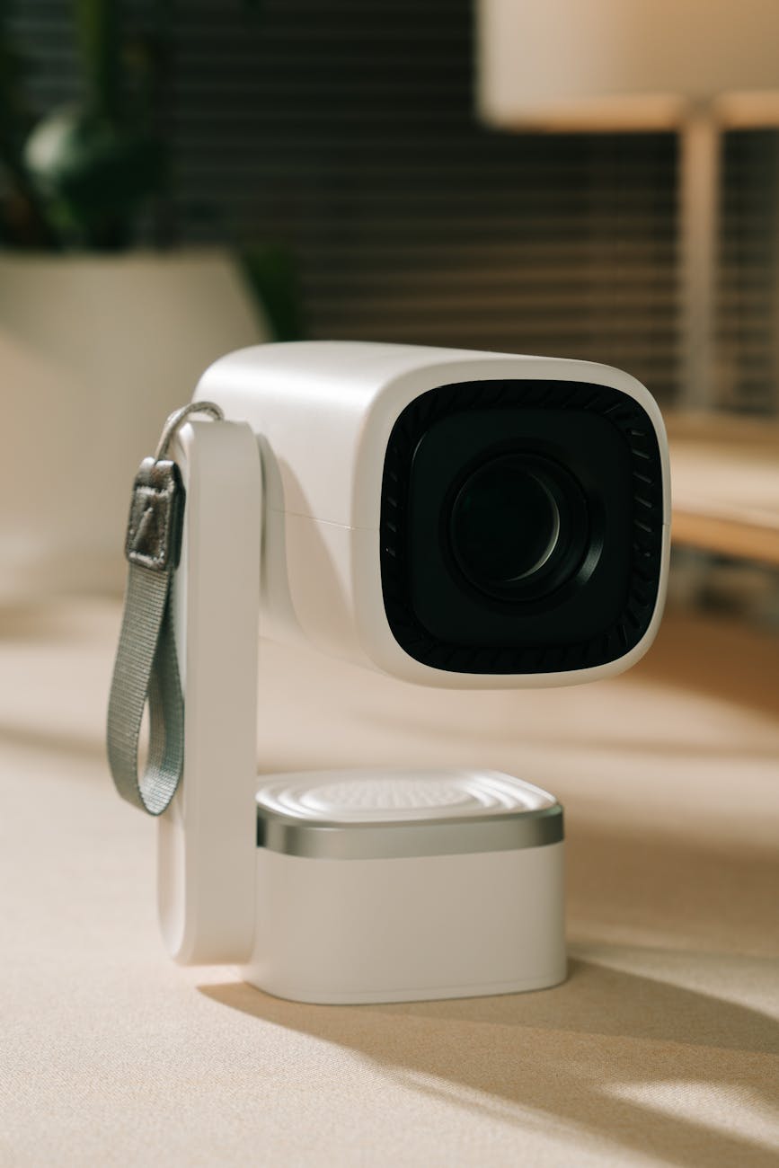 Modern white portable projector on desk