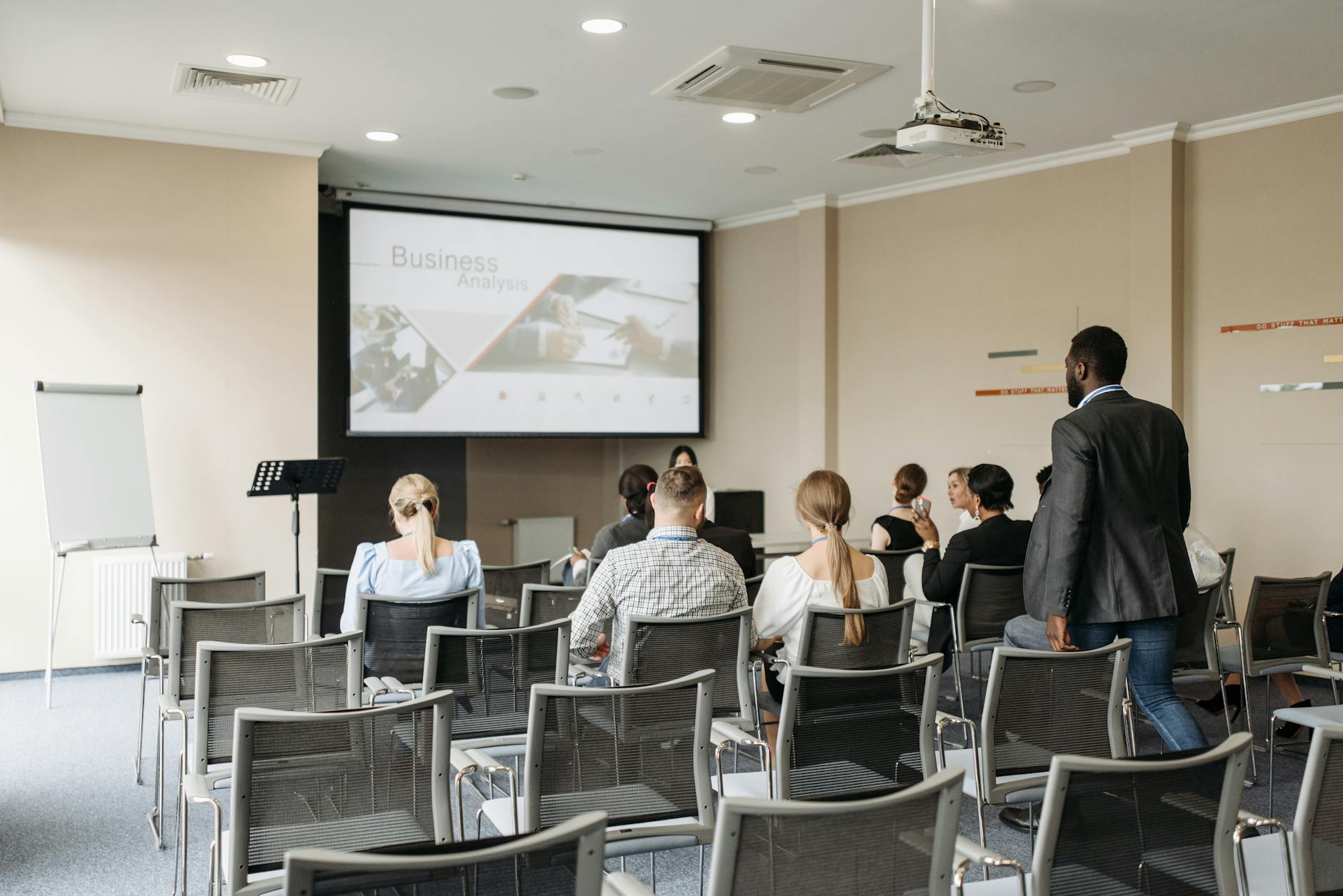 A group of people inside the conference room